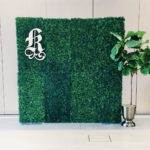 green boxwood flower wall