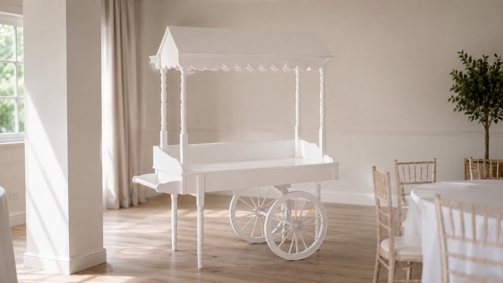 Empty white candy cart standing ready before a party with bare shelves